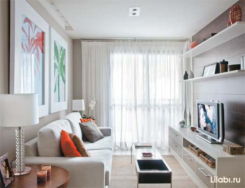 Дизайн гостиной с угловым диваном и угловым шкафом